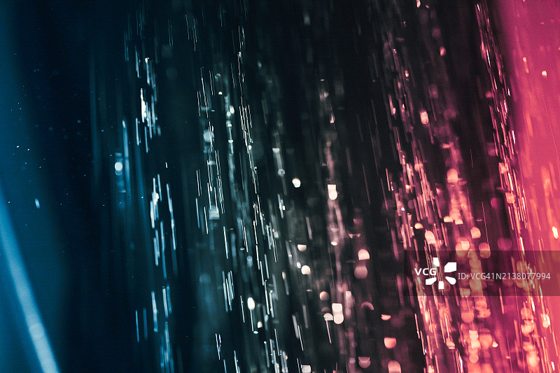 蓝色和红色水花的飞溅。长曝光抽象摄影图片素材