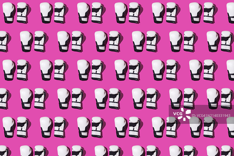 黑白拳击手套图案：运动格斗训练概念图片素材