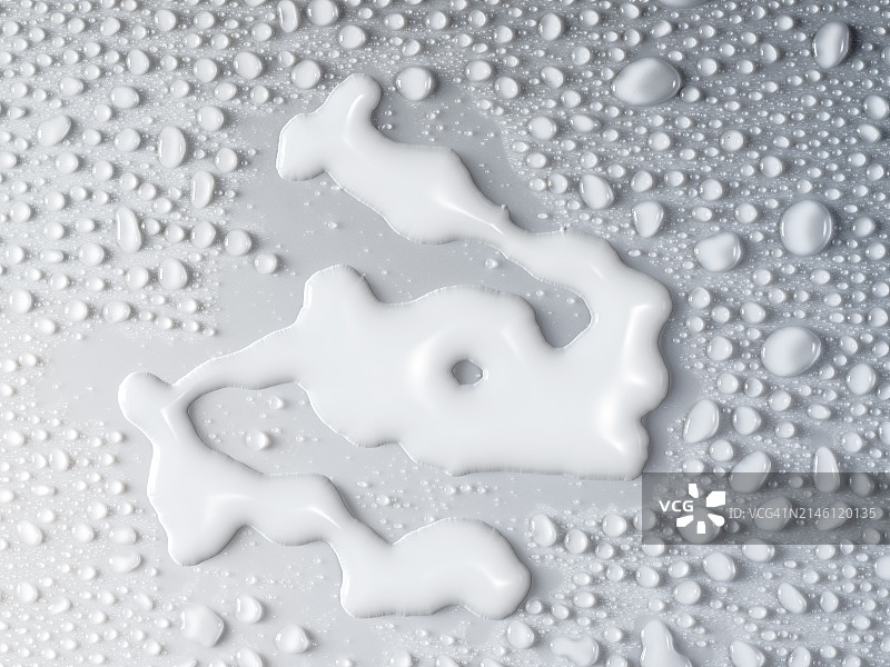 滴在白色表面上的热牛奶，带有小水滴图片素材