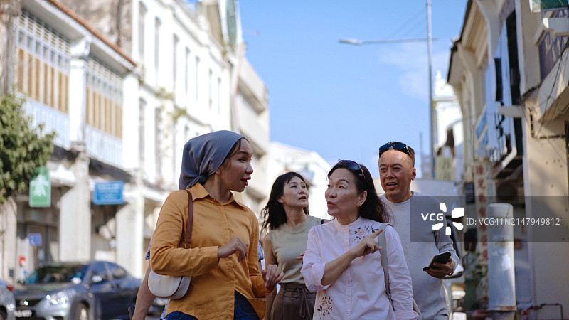 亚洲导游与游客图片素材