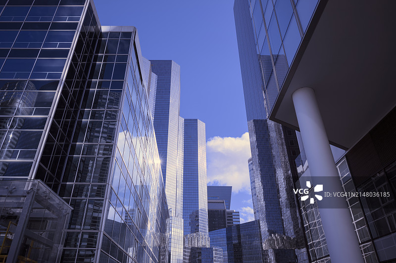 现代办公楼与蓝天白云组合图片素材