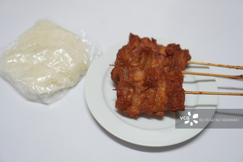 炸猪肉与鱼露和糯米图片素材