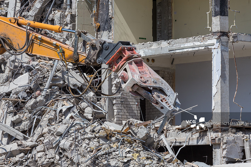 拆除起重机拆除建筑物图片素材