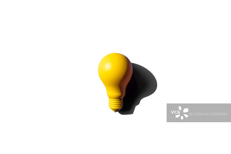白色背景上隔离的黄色白炽灯泡图片素材