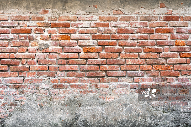 带有苔藓的旧破损砖墙石膏图片素材