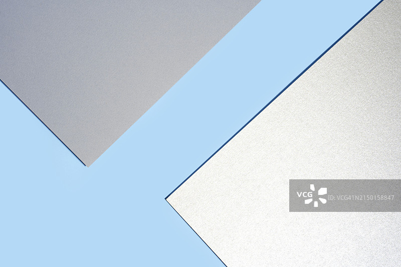 粉彩蓝绿色、灰色、银色调的彩色纸板纸版式图片素材