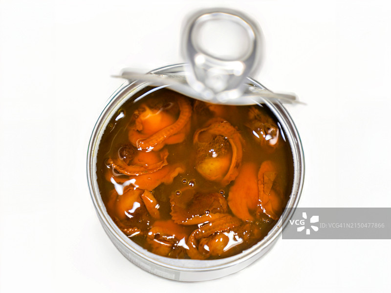 盐水扇贝：罐装海鲜美味图片素材