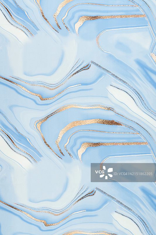 纺织品上粉色蜡笔颜料的大理石效果图片素材