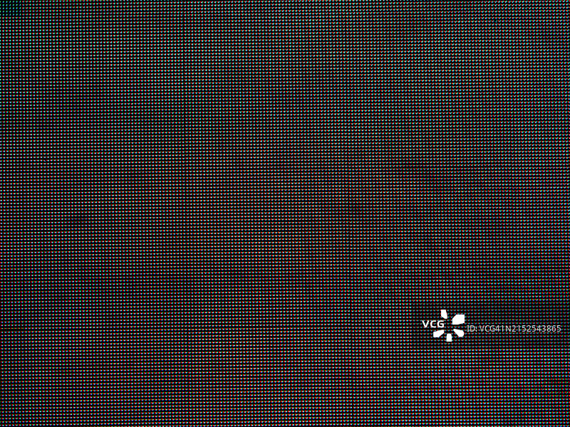 黑色背景上的红蓝LED灯：纽约时代广场广告屏幕特写图片素材