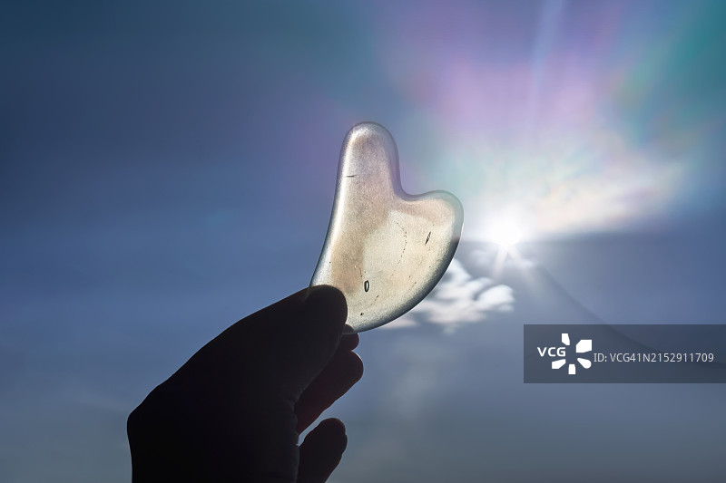 月光石刮痧板面部按摩器图片素材