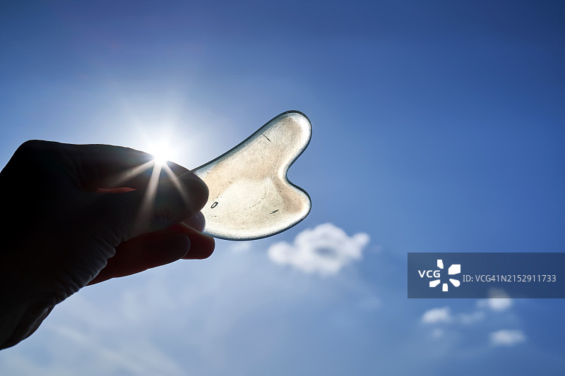 月光石刮痧板面部按摩器图片素材