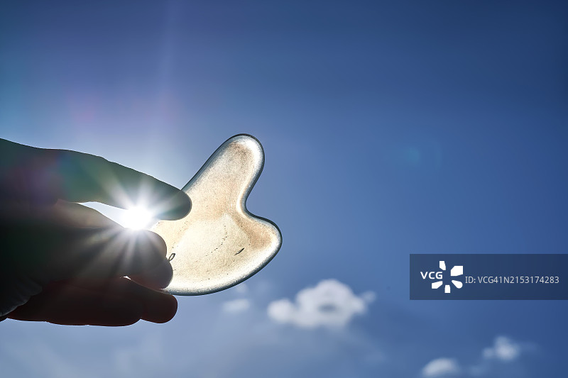 月光石刮痧板面部按摩器图片素材