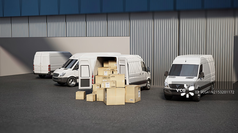 繁忙的仓库或装货码头，有运送货箱的货车图片素材