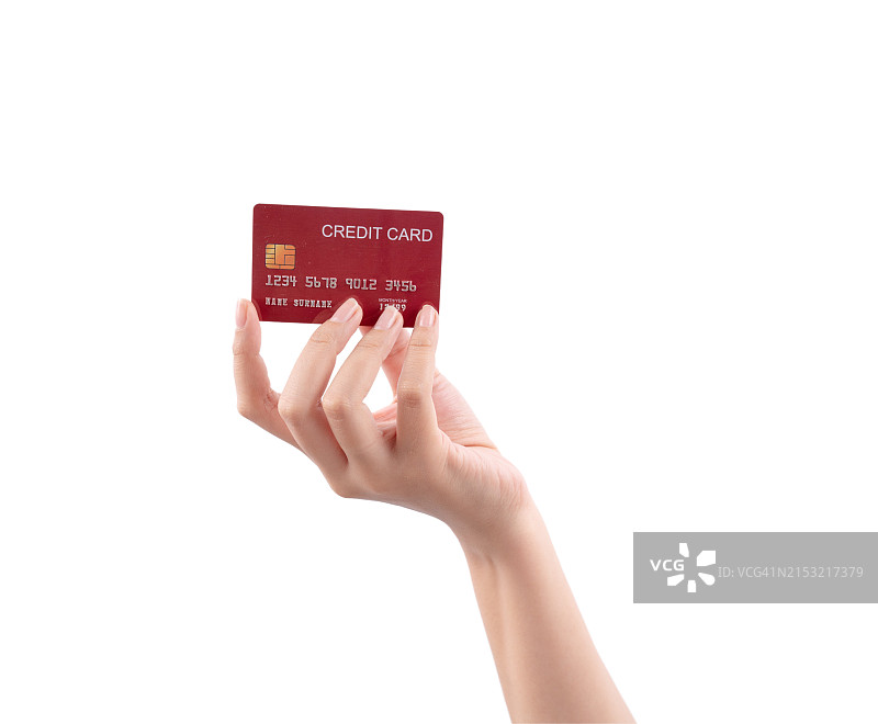 手持带有芯片的红色信用卡图片素材