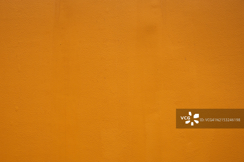 纯橙色墙面背景图片素材