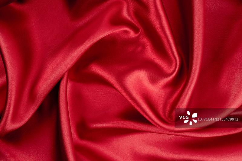 有褶皱纹理的红丝绒丝绸面料背景图片素材