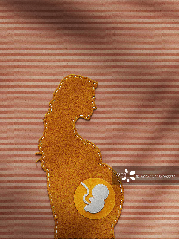 感觉怀孕的女人与胎儿概念图片素材