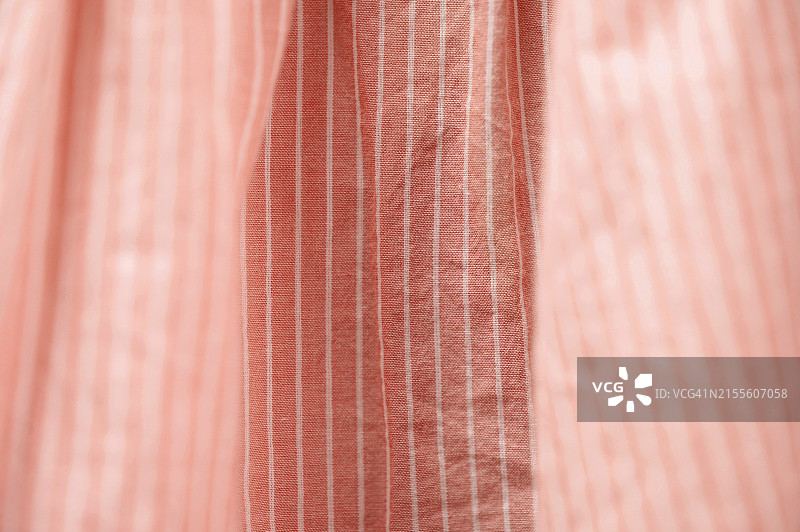柔和的粉色条纹面料纹理图片素材