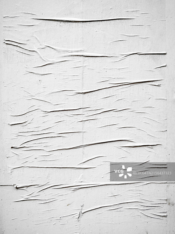 贴在英国伦敦墙上的白色海报图片素材