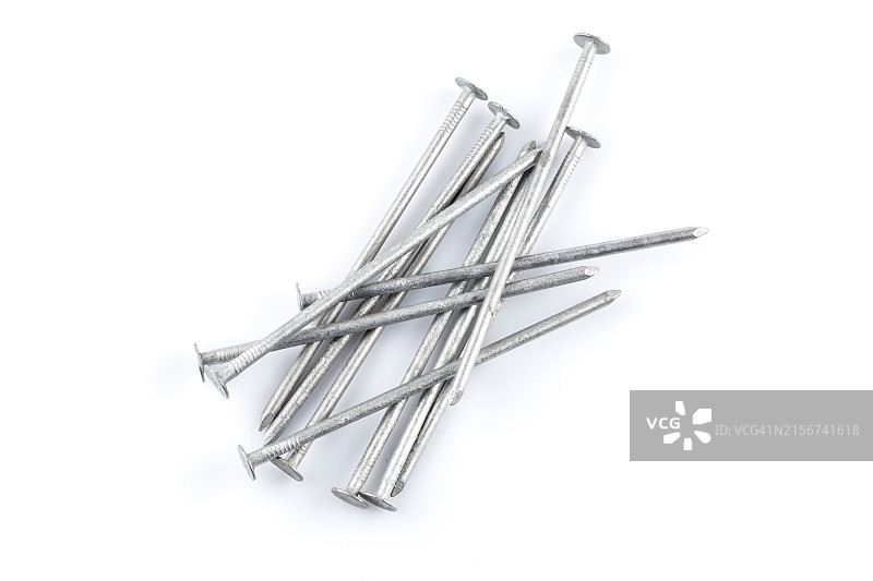 白色背景上的金属钉图片素材