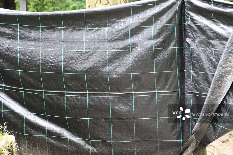 悬挂的地面覆盖材料防水布图片素材