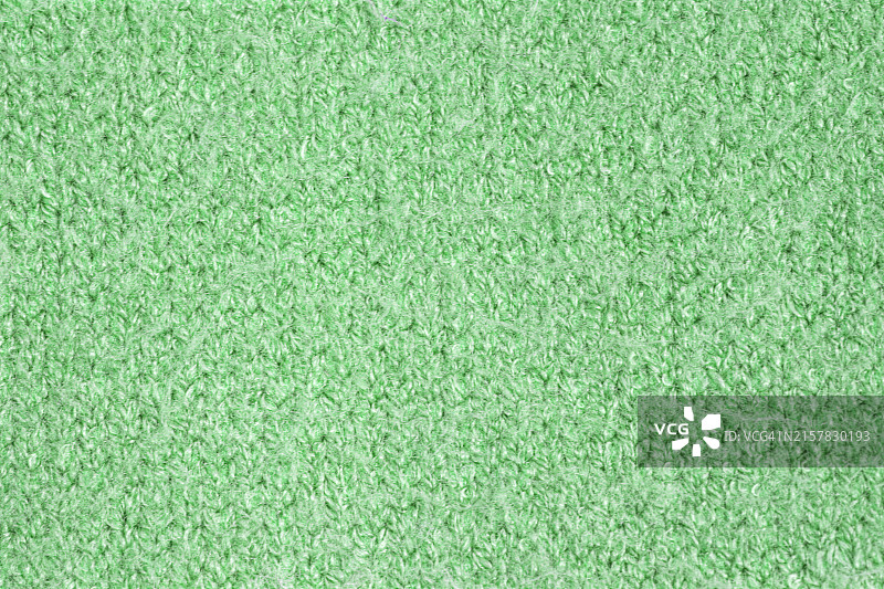 柔软的绿色针织面料特写图片素材