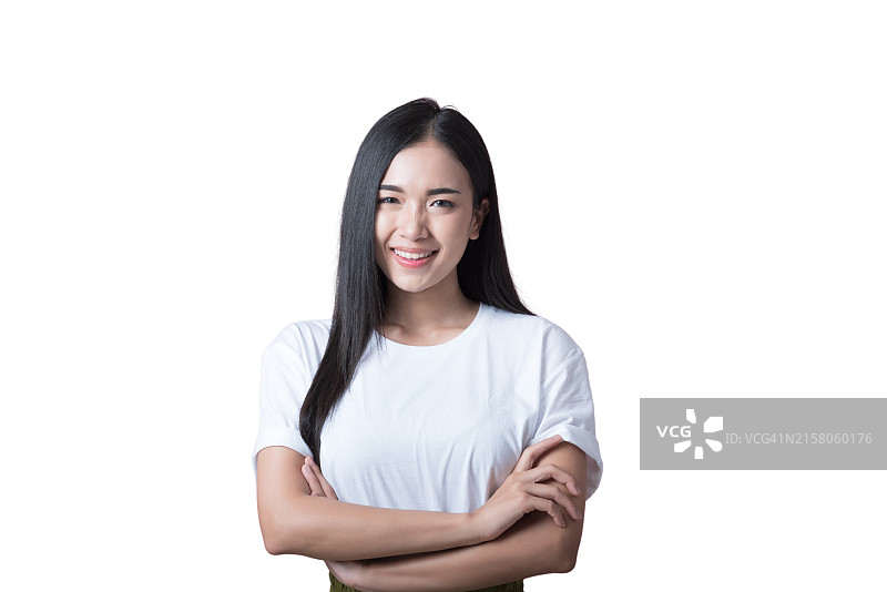 长发女人微笑，穿着白衬衫图片素材