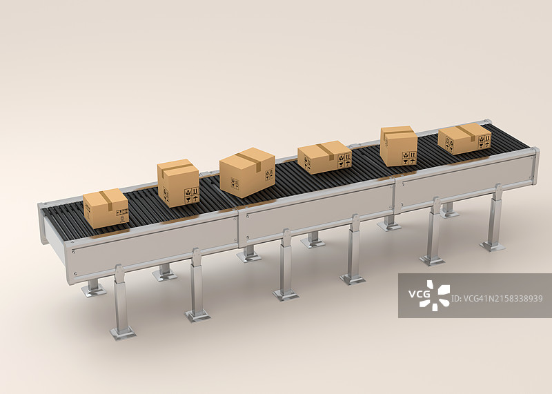 白色传送带上的纸箱图片素材