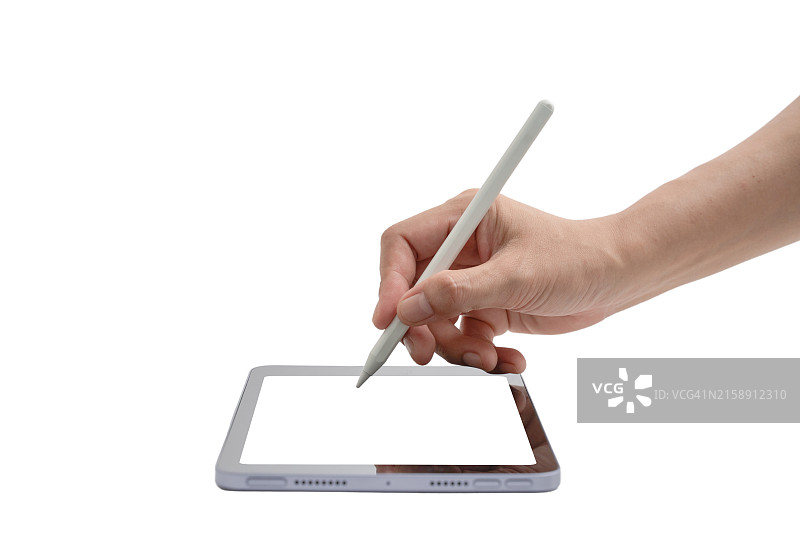 一个人用笔在平板电脑上写字图片素材