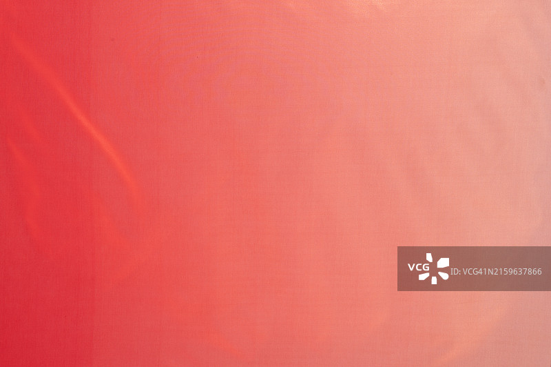 一块带有黄色和粉色条纹的织物图片素材