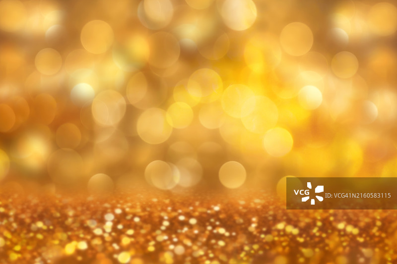 优雅金色圣诞灯光散景闪耀背景图片素材
