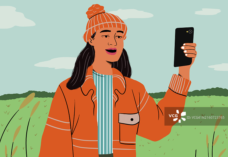 年轻女子在空旷的田野里用智能手机录制视频博客的插画图片素材