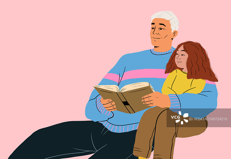 爷爷给孙女讲故事，靠在粉色背景上图片素材