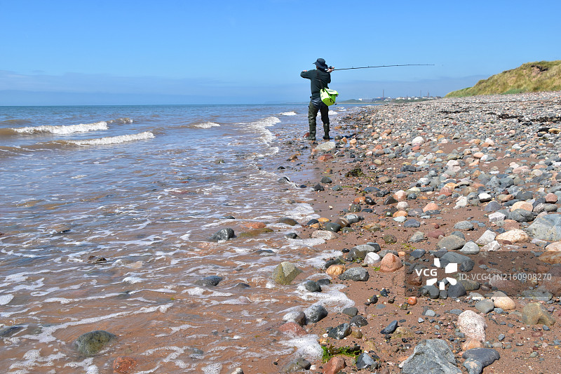在坎布里亚郡德里格海滩钓鱼图片素材