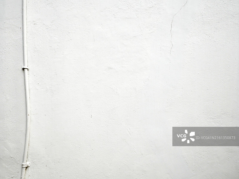 英国伦敦白色混凝土墙及电缆特写图片素材