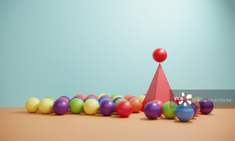 金字塔顶部的不同球体图片素材