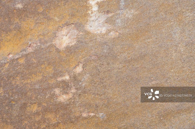 纹理粗糙的天然石材特写，横版构图，留白充足图片素材