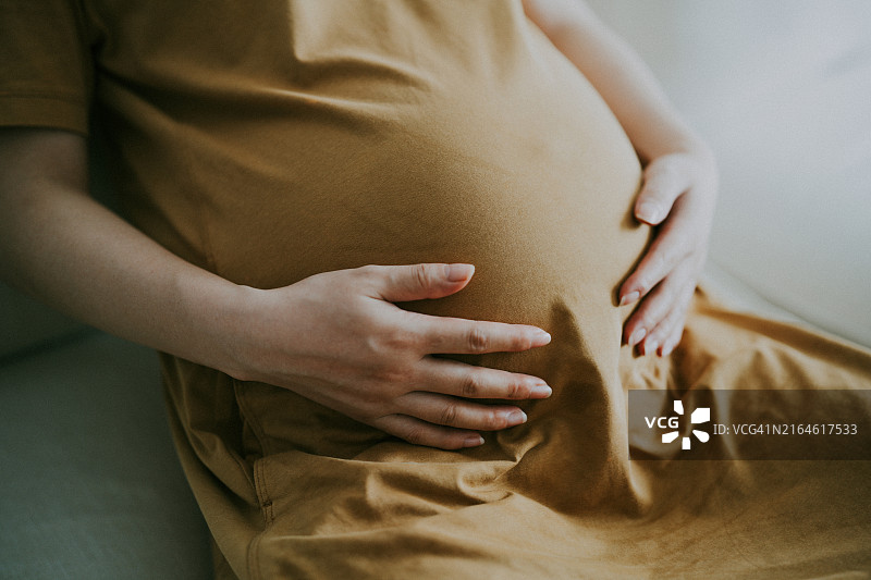 怀孕妇女的腹部特写图片素材