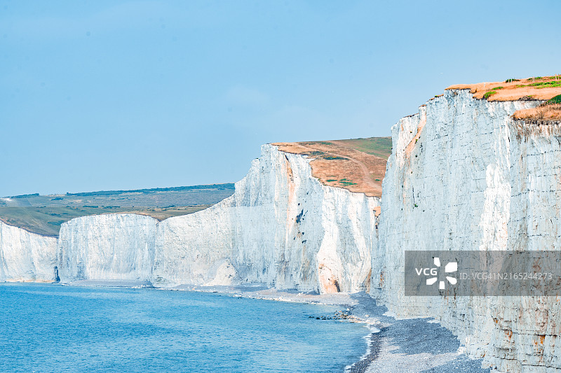 英格兰东萨塞克斯郡伊斯特本附近伯灵峡的七姐妹白色粉笔悬崖图片素材