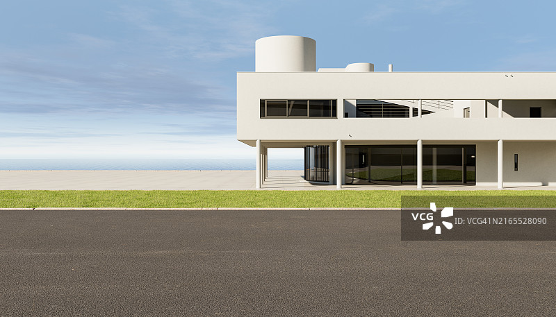 带绿色草坪的现代住宅前的沥青路图片素材