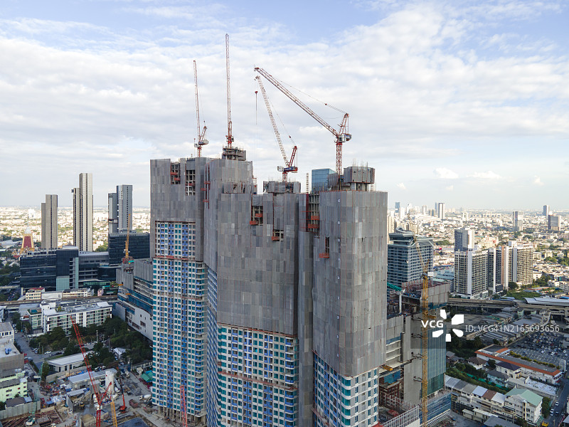 使用起重机的高层住宅区建筑工地图片素材