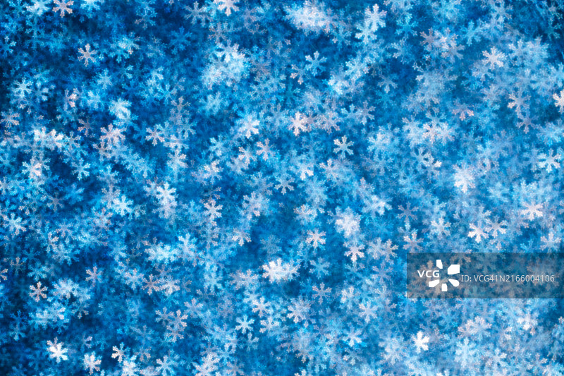 蓝色闪光冬季雪花散景灯光背景图片素材