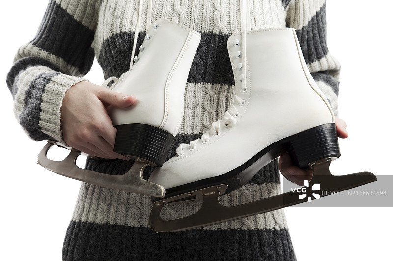 参加冬季滑冰运动的女人图片素材