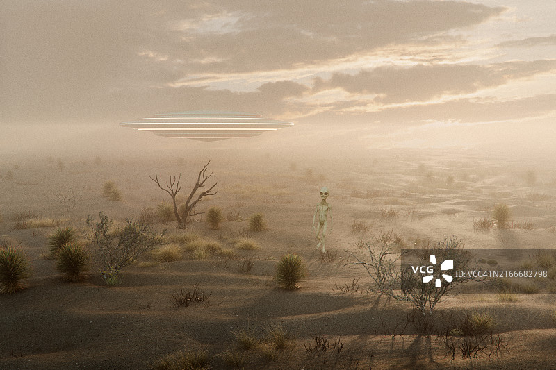 在偏远沙漠地区行走的外星人图片素材