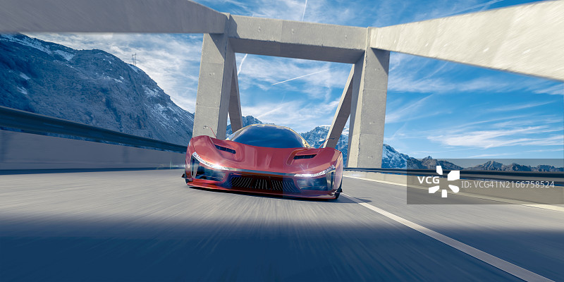 红色电动跑车行驶在山间桥梁上图片素材