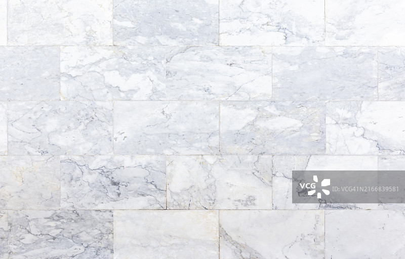 磨损的光滑天然大理石瓷砖地板，俯视角度图片素材