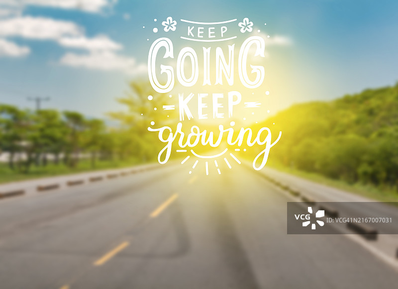 沥青路上的励志标语图片素材