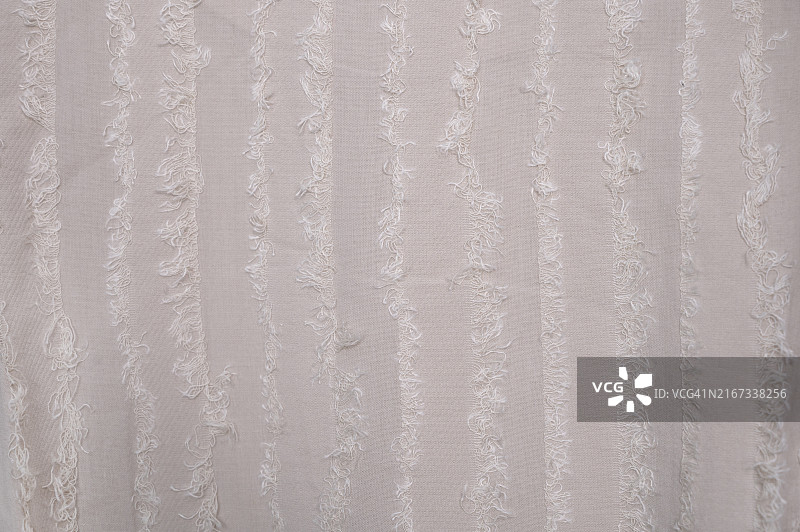 白色和奶油色纹理面料特写图片素材