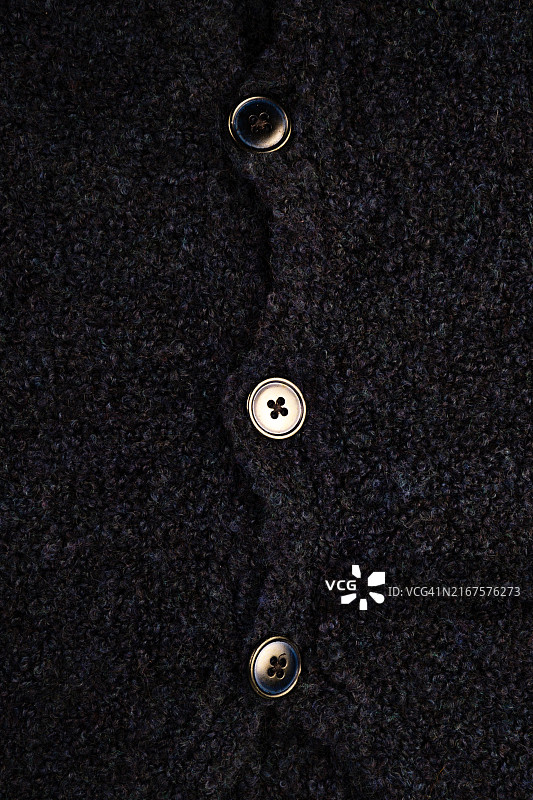 针织面料：针织毛衣的漩涡图案纹理图片素材