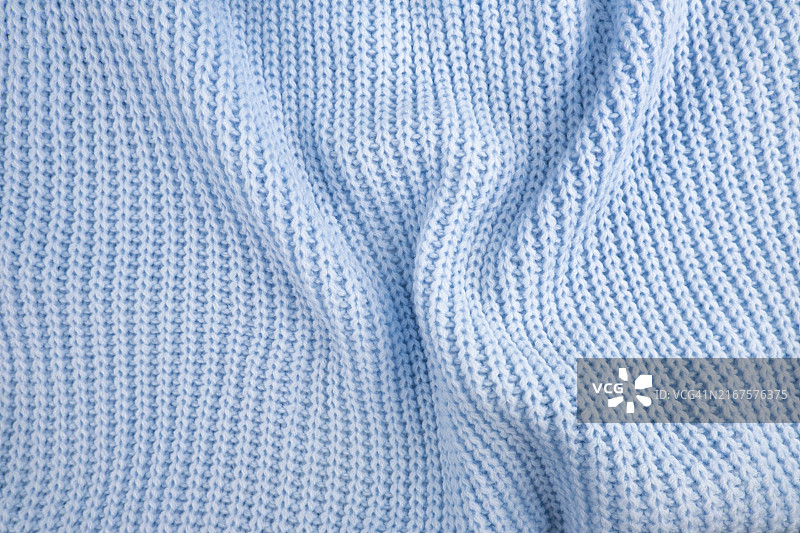 针织面料：针织毛衣的漩涡图案纹理图片素材